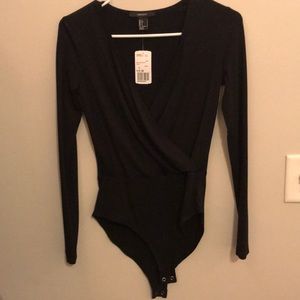 Women’s black, long sleeved body suit.